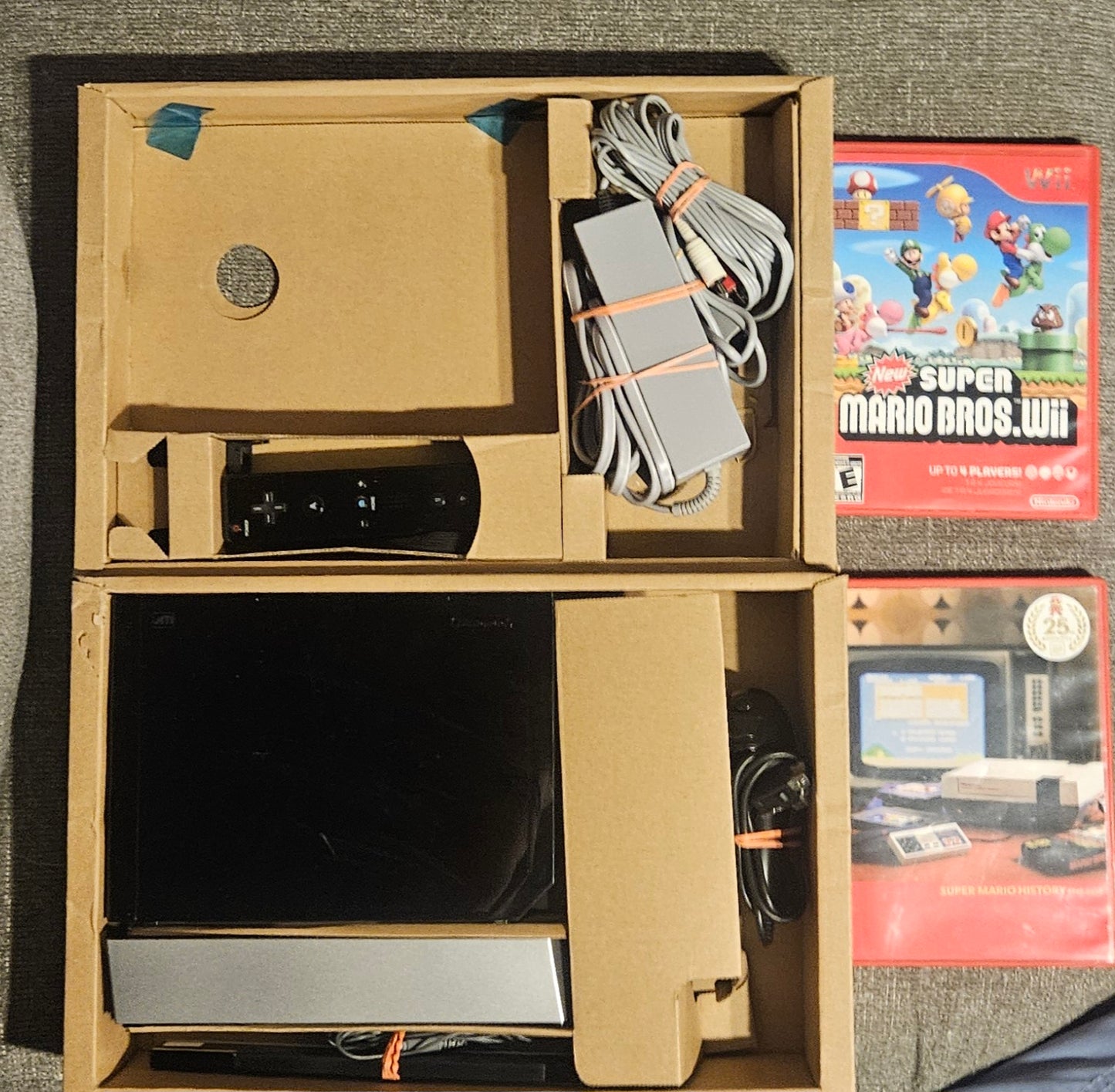 Nintendo WII System (New Super Mario Bros. Edition)